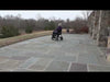 A video showcasing an elderly woman riding the Journey Air Elite Power Chair outdoors.