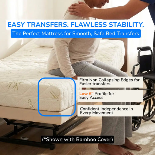 Person transferring from a wheelchair to a Transfer Master Ascent mattress, highlighting the extra firm edge support and low 6-inch profile for safe transfers.
