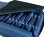 Close-up view of the specially designed air cells in the mattress with the mattress cover zipped open, highlighting the internal structure responsible for alternating pressure and air flow.