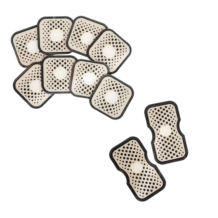 Set of TENS electrode pads for Oceanus Stimsonic device showing multiple perforated adhesive patches with central contact areas in various body-contoured shapes