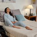Woman relaxing in elevated position on the Transfer Master Supernal 3 adjustable hospital bed