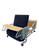 The ReNuCare Standing Bed is a 4-position adjustable hospital bed with metal rails, wood headboard and footboard, and tray table. Set upright on a wood-patterned floor, it offers enhanced comfort and support.