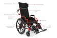 A red Ziggo Pro pediatric reclining wheelchair with labels pointing to the curved headrest, reclining back, full back support, pelvic belt, elevating leg rests, quick-release rear wheels, and flip-back desk arms.